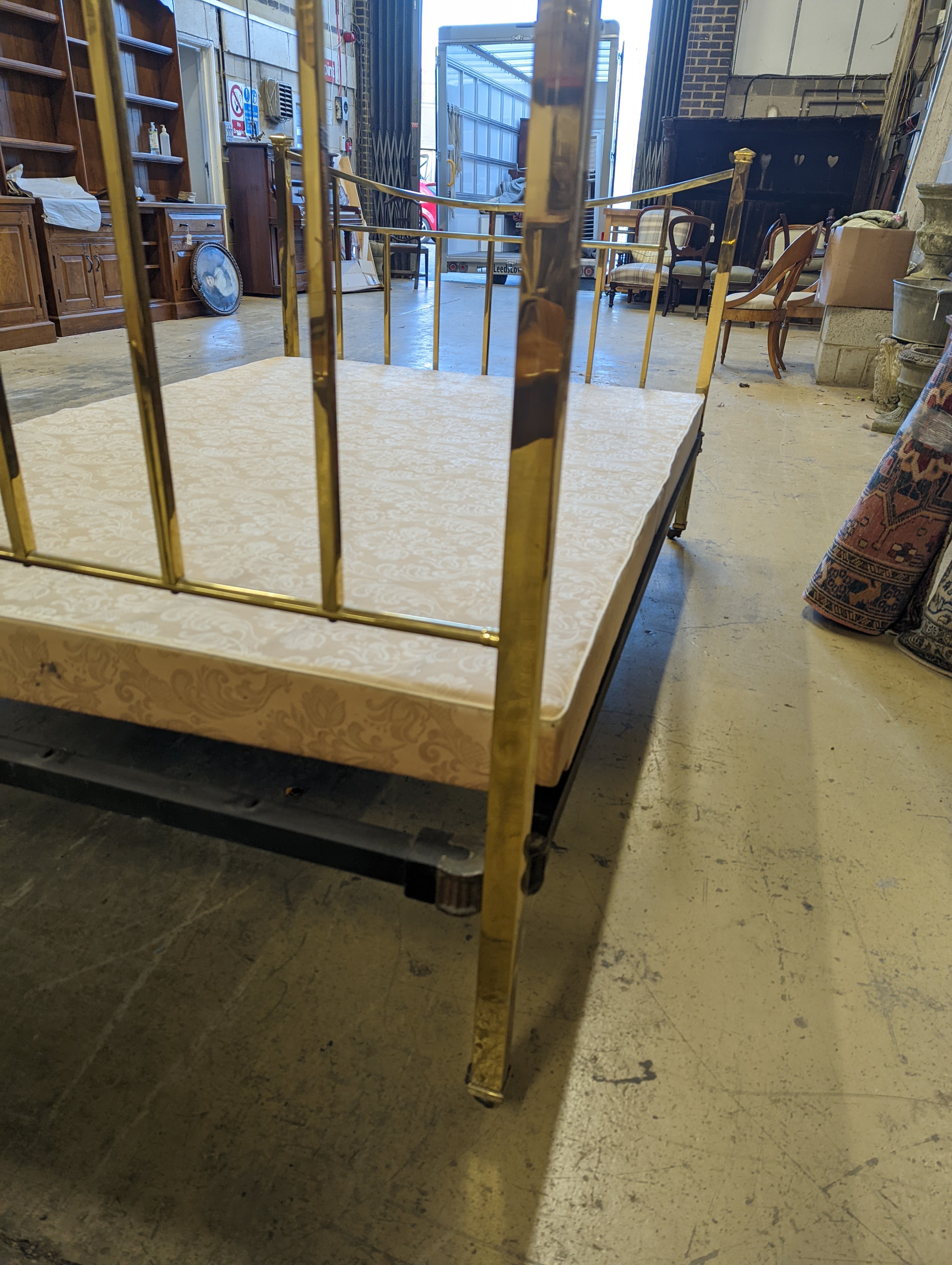 An Edwardian brass double bed frame, length 212cm, width 140cm